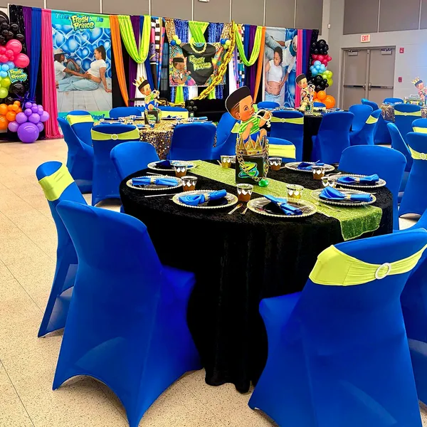 Decorated event table with place settings and floral accents